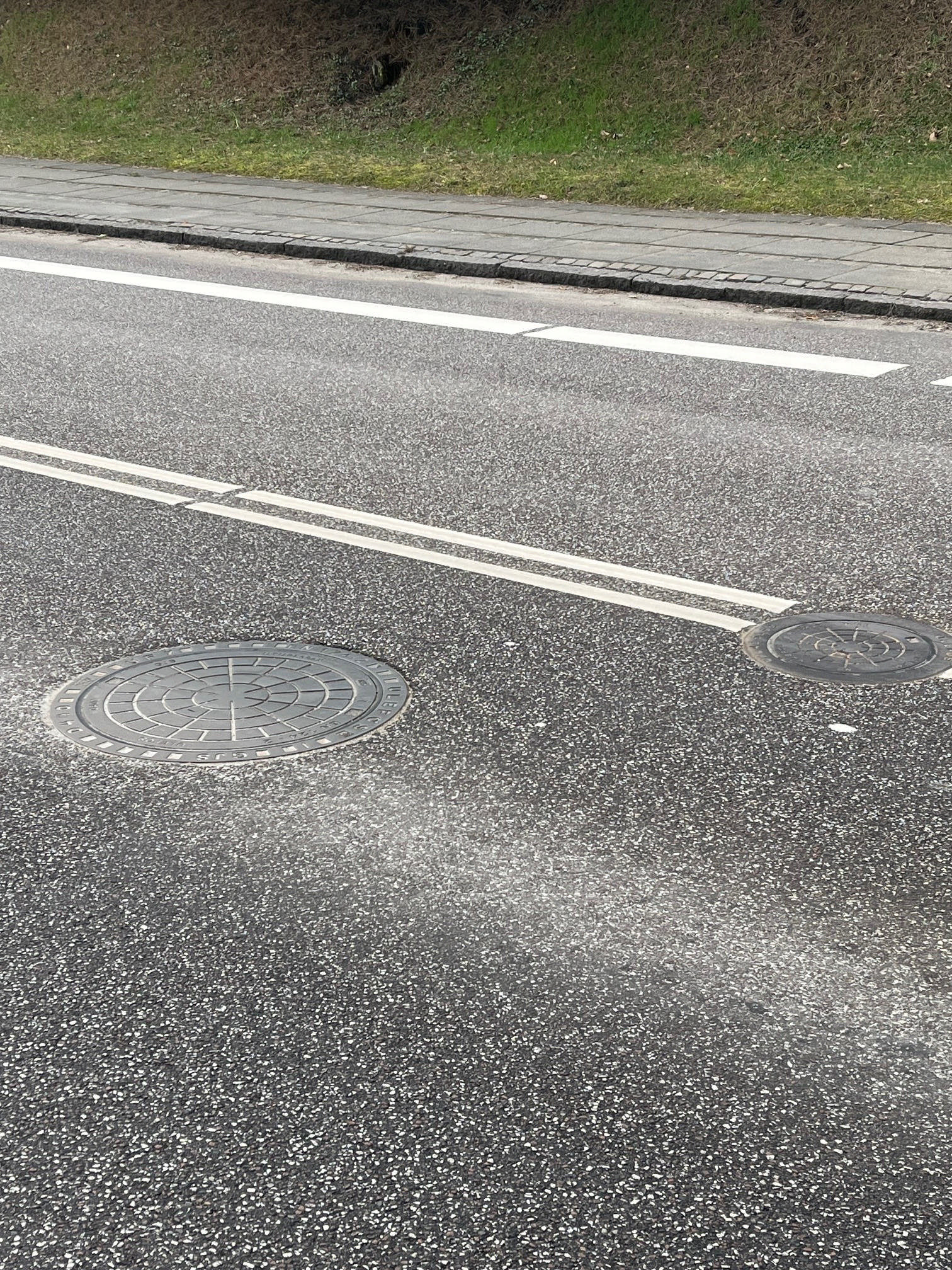 Billede af brønddæksel