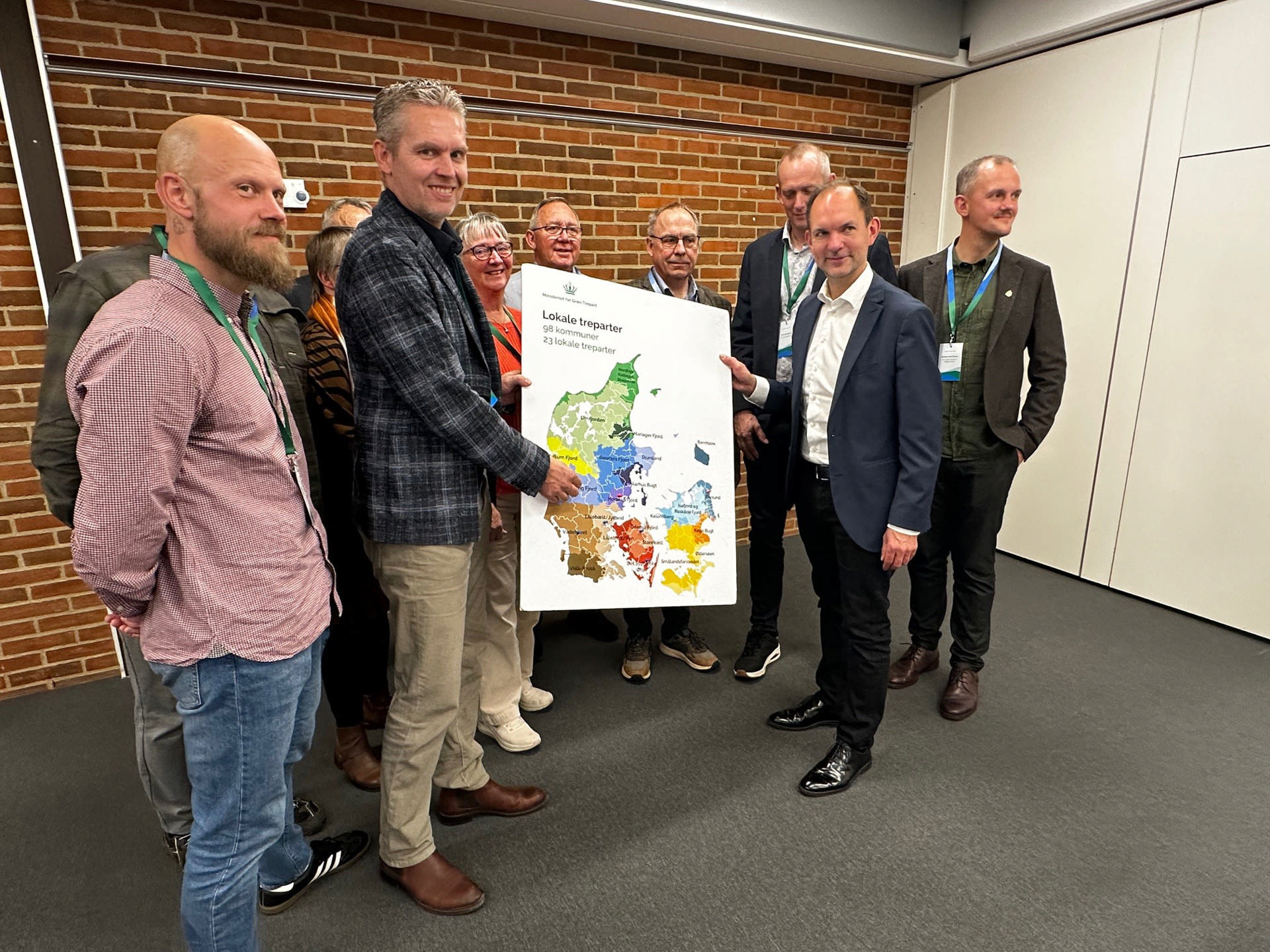 medlemmer af treparten og ministeren