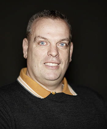 Portrætbillede af politikker Hans Nygaard Zhou (Æ)