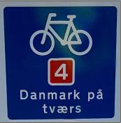 Dette billede viser et skilt, der symboliserer en national cykelrute